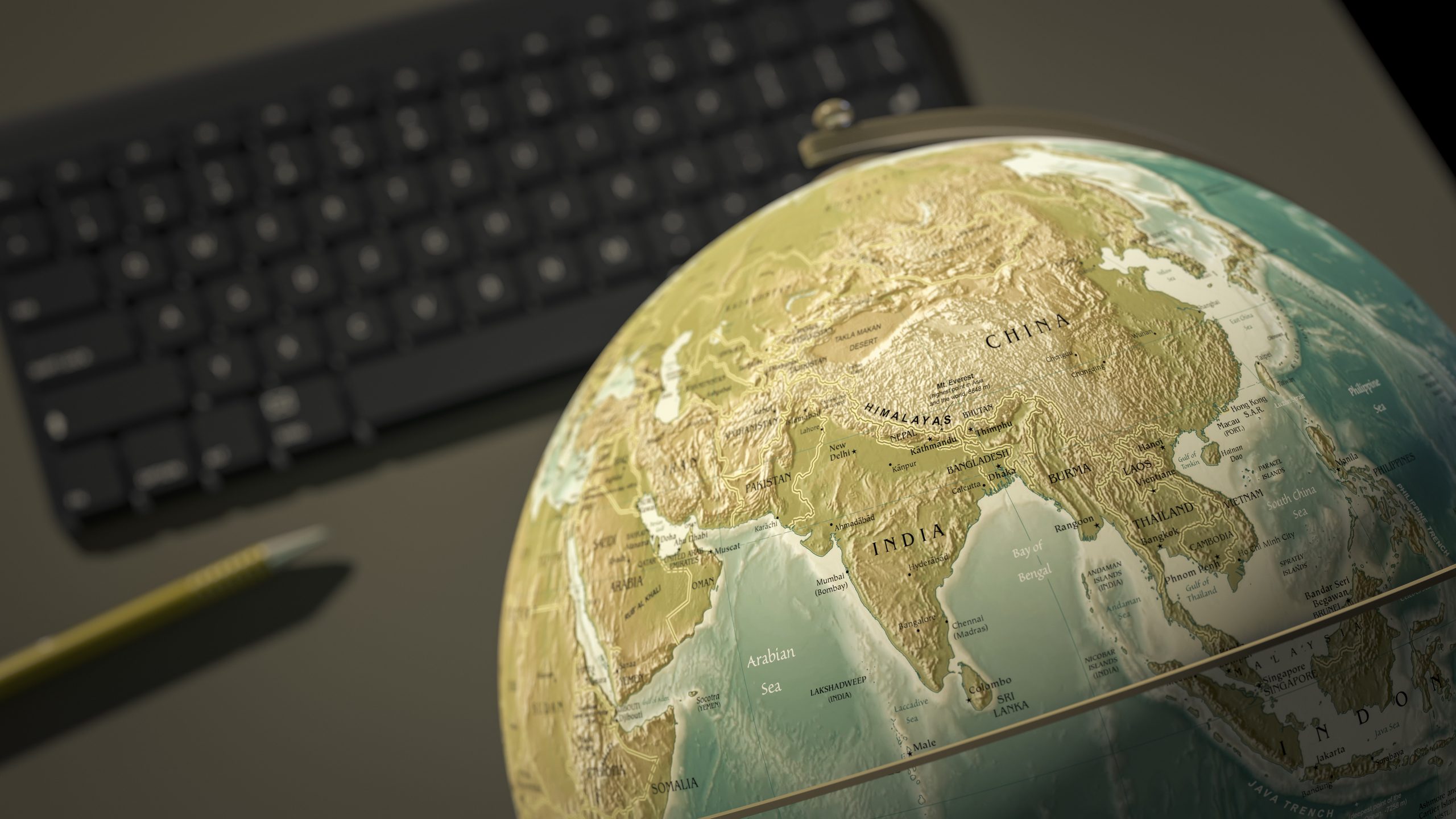 3d rendering of a globe on a desktop shows India